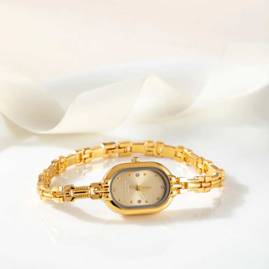Women's slim minimalist watch with a clean dial and fine strap in a classic finish