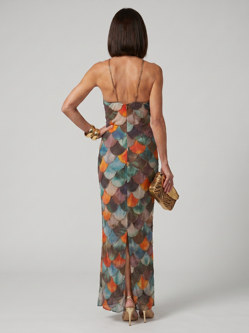 Geometric multicolour scale print halter neck maxi dress with a sleek fitted silhouette