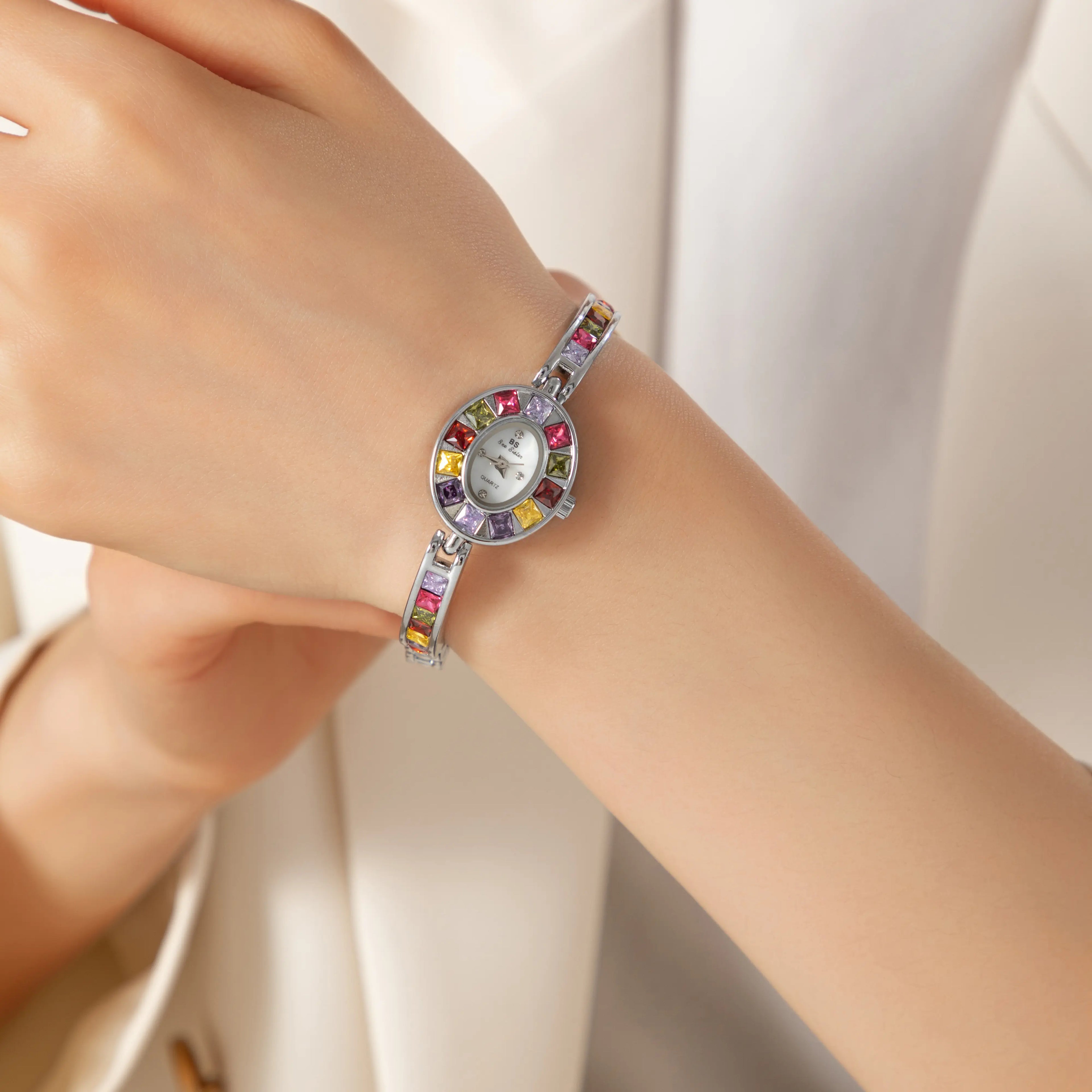 Women's colourful watch with golden detail trim in gold tones