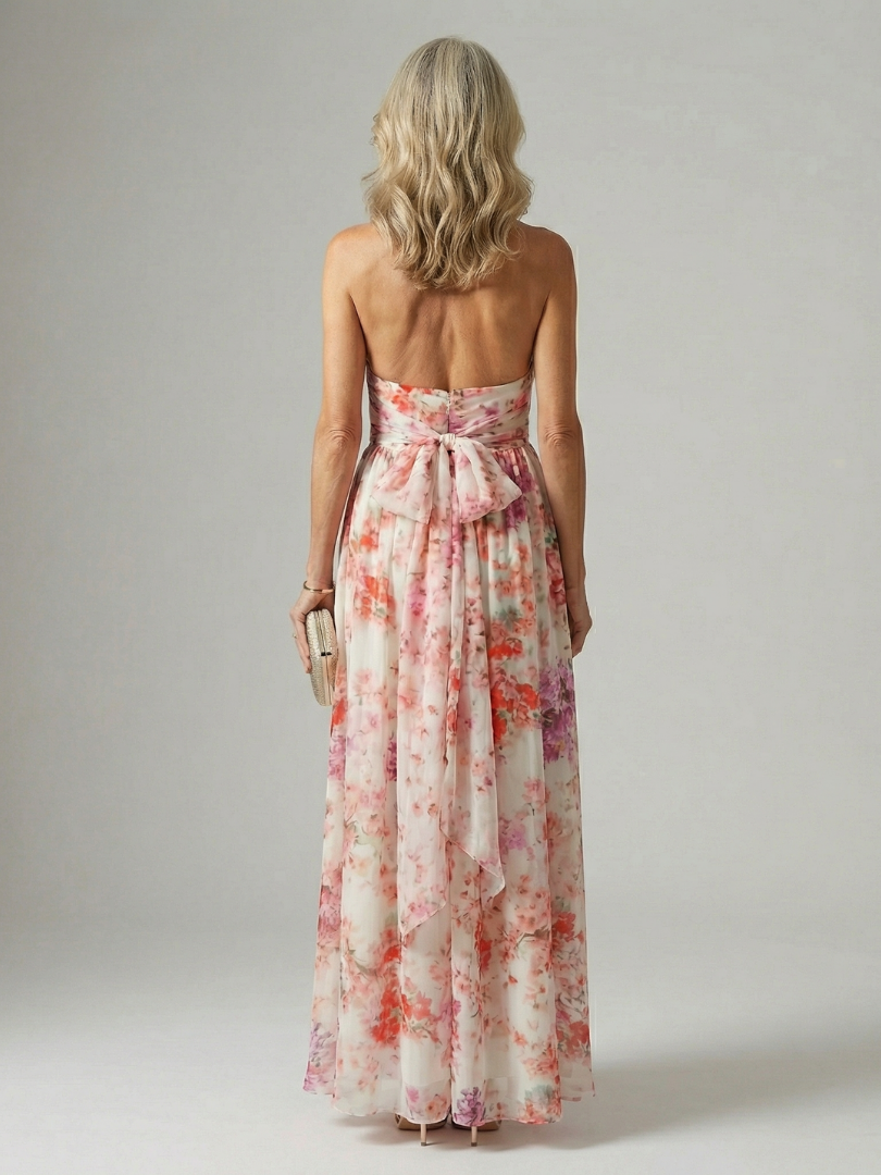 Floral halter neck maxi dress with a ruched neckline detail and a relaxed flowing skirt