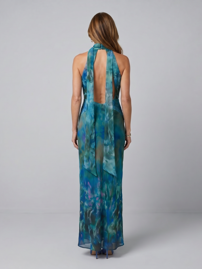 Blue halter neck maxi dress with a sheer floaty overlay and front slit