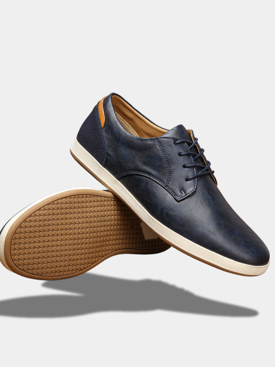 Men's light tan smart casual trainers with a smooth refined upper and clean low-profile sole