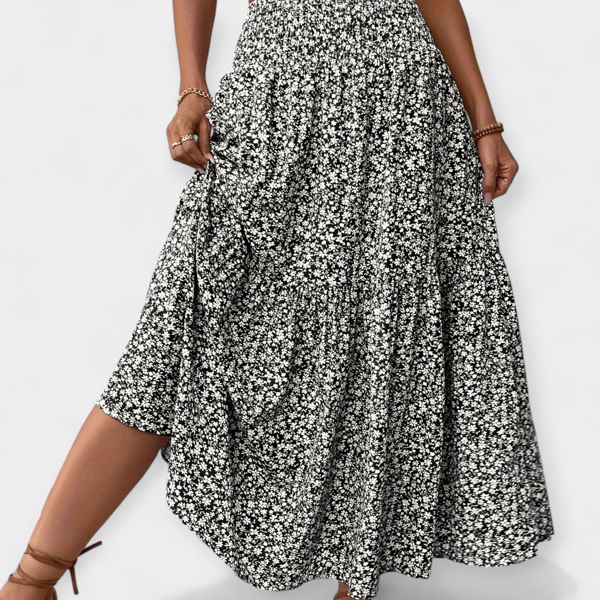 Floral midi skirt in violet print with elasticated waist and discreet side pockets