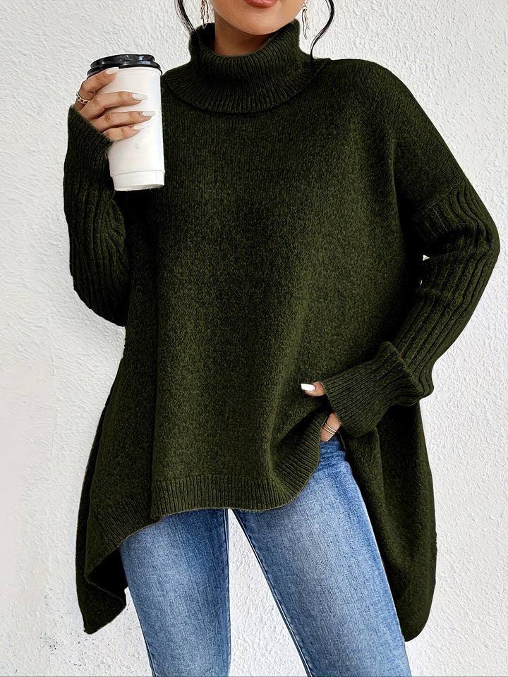 A woman wearing a stand-collar jumper with a chic asymmetric drape, warm and polished.
