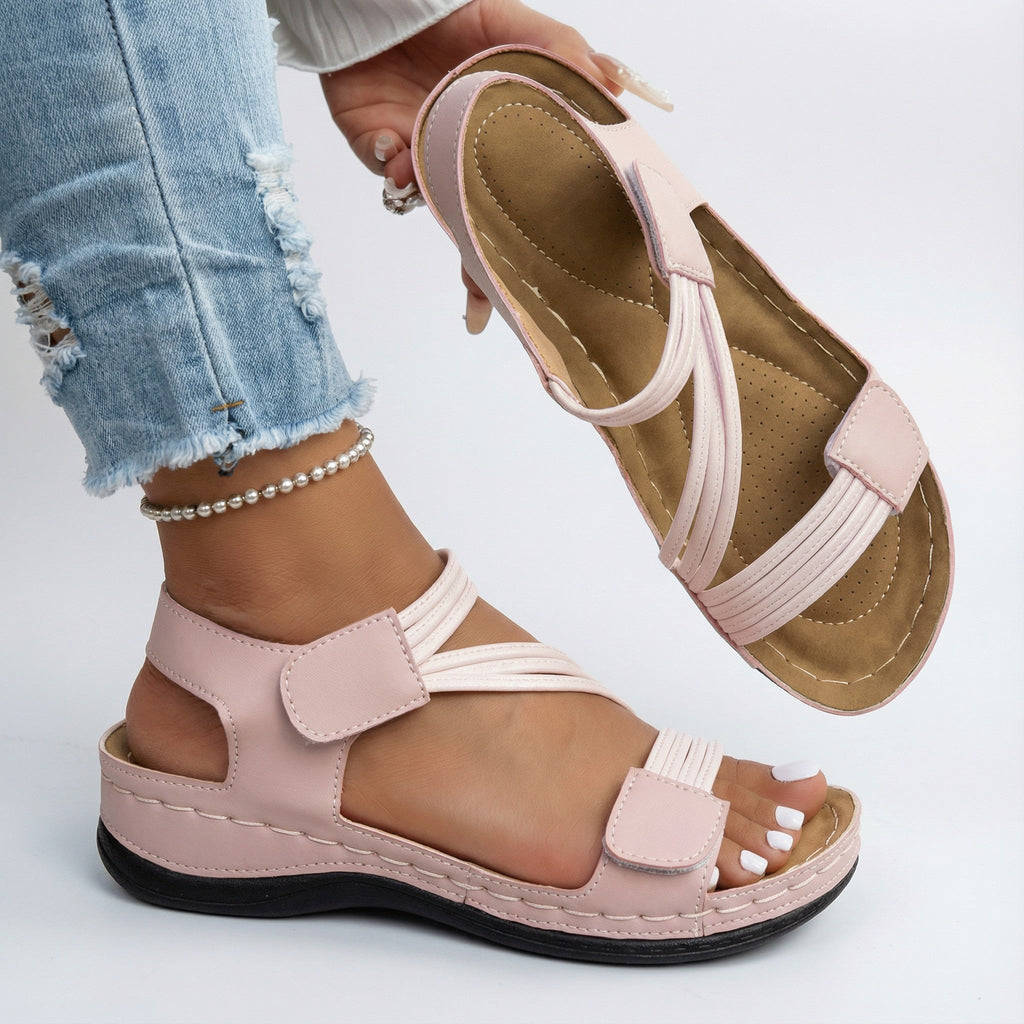Women's easy strap sandals with a cushioned sole in blue, black, white, rose and beige