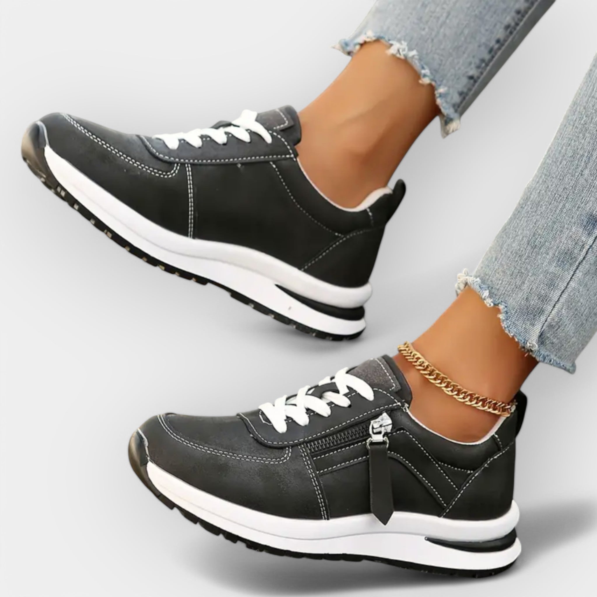 Women's elegant anatomic trainers in black with a supportive cushioned sole