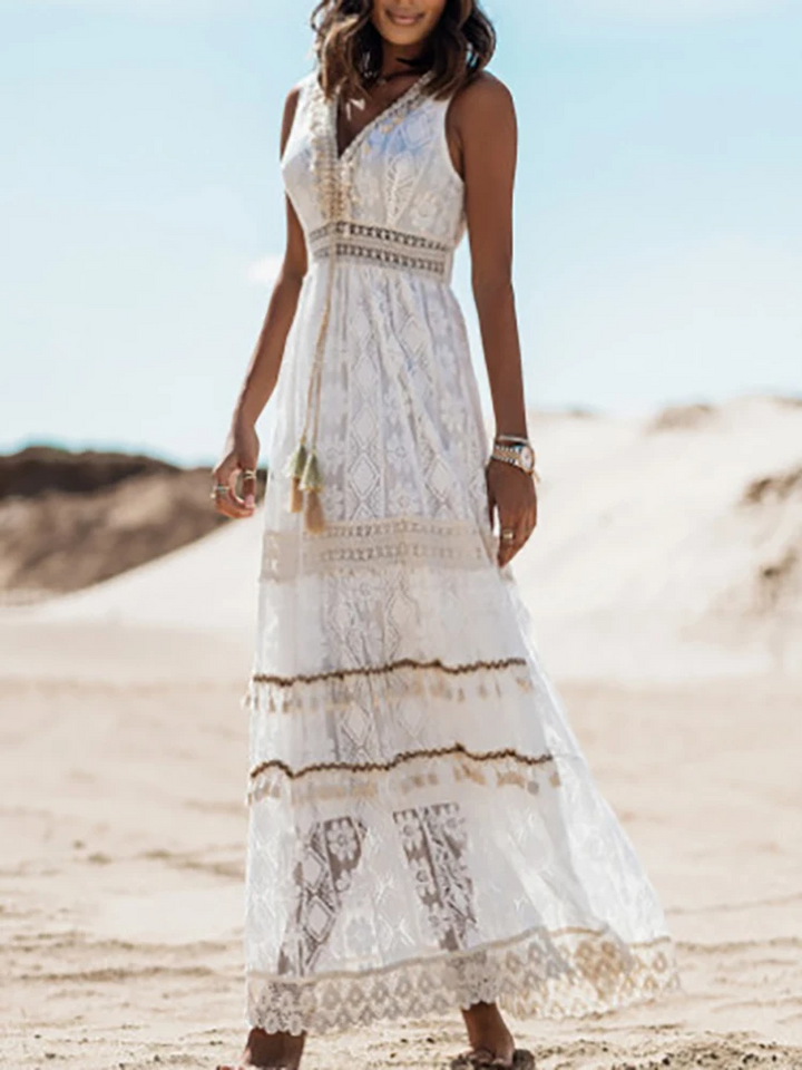Woman wearing an elegant boho midi dress with a V-neckline at a daytime gathering.