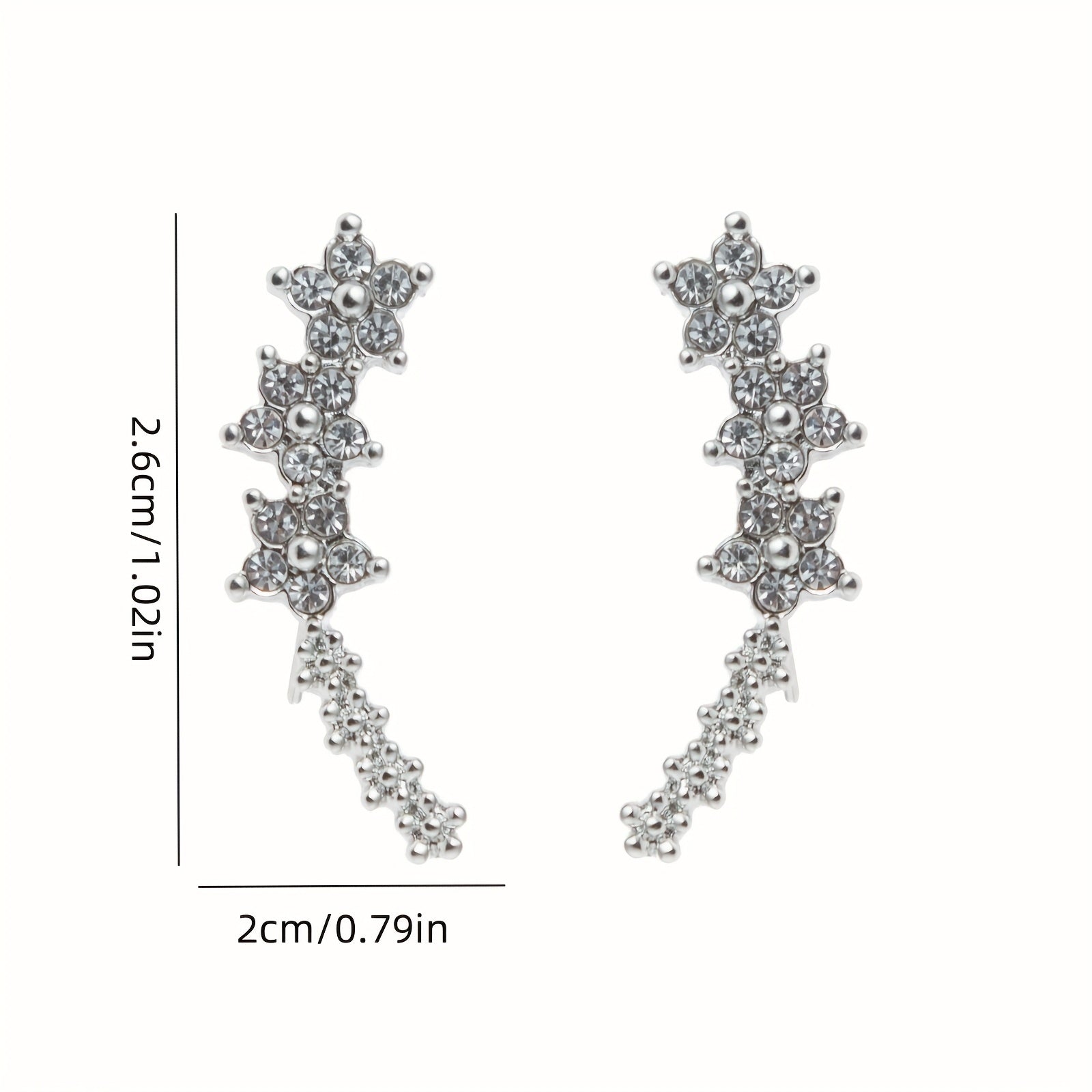 Rose gold floral crawler earrings with delicate sparkling floral motif following the curve of the ear