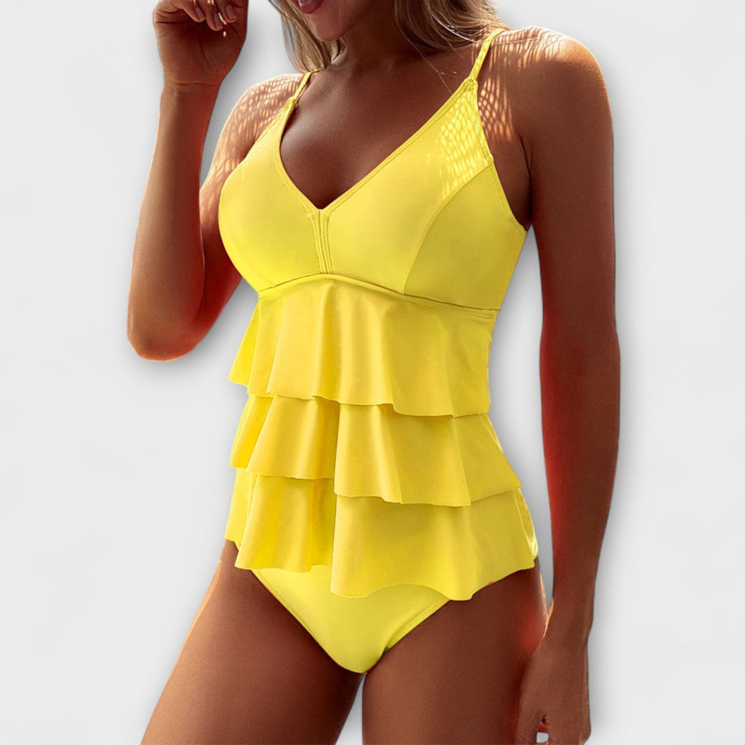 Coral frill tankini with a flowing frilled top and matching bottoms