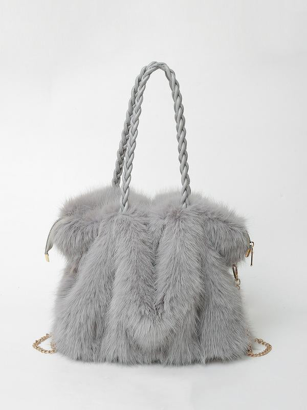 Soft-touch shoulder bag in deep brown with a plush, luxurious texture