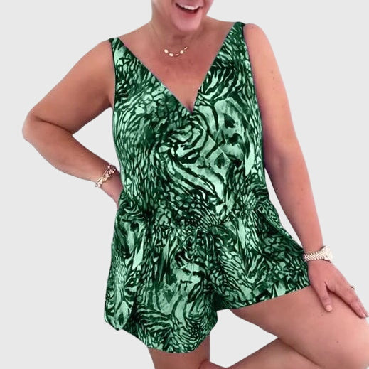 Women's swim dress in blue, purple and green with an elegant skirt silhouette