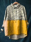 A multicolour lightweight top with clean lines and a relaxed, polished silhouette