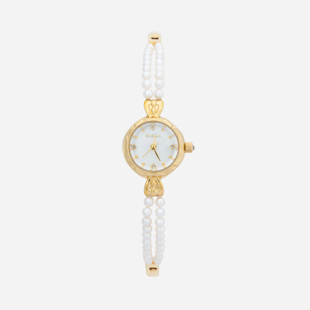 Women's gold watch with elegant twisted chain bracelet strap and a refined dial