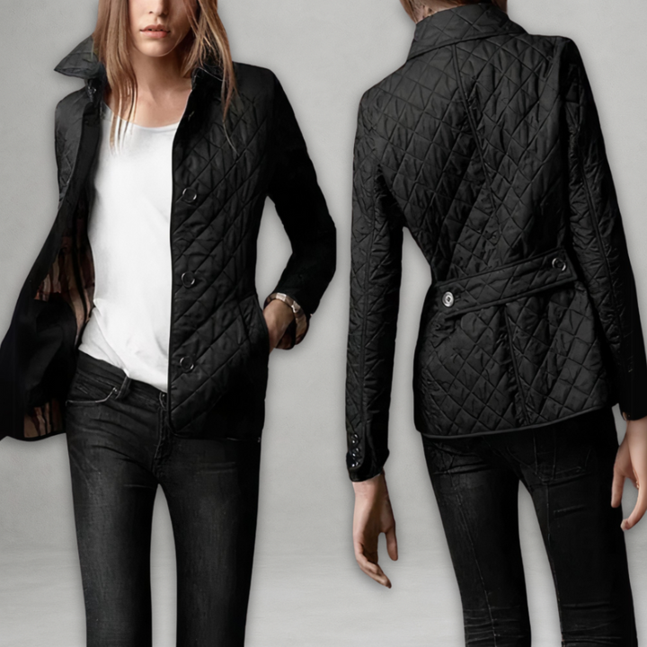 A woman wearing an autumn jacket over a top, layered for a crisp day in town.