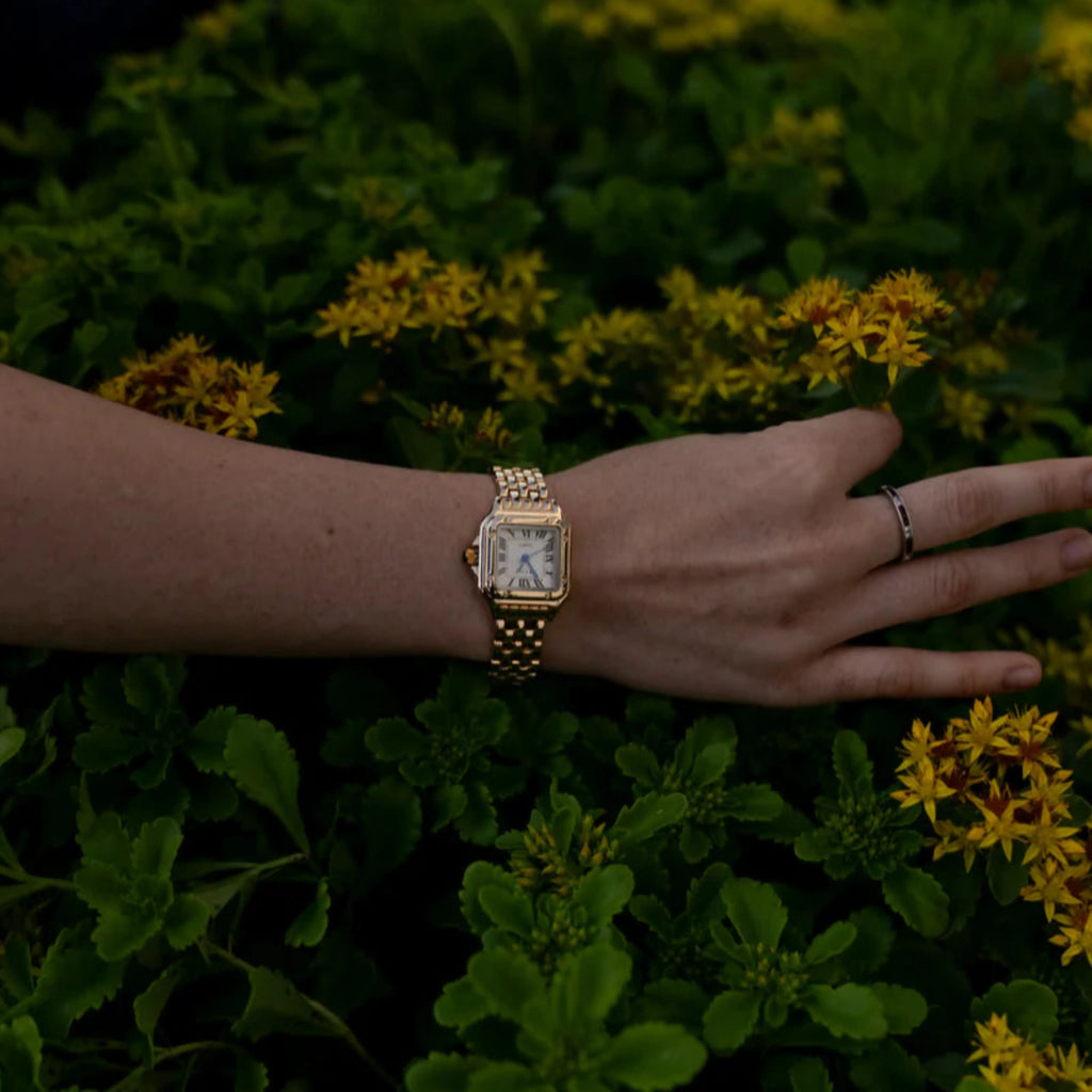 Colourful boho women's bracelet watch with a patterned strap and contrasting dial in gold