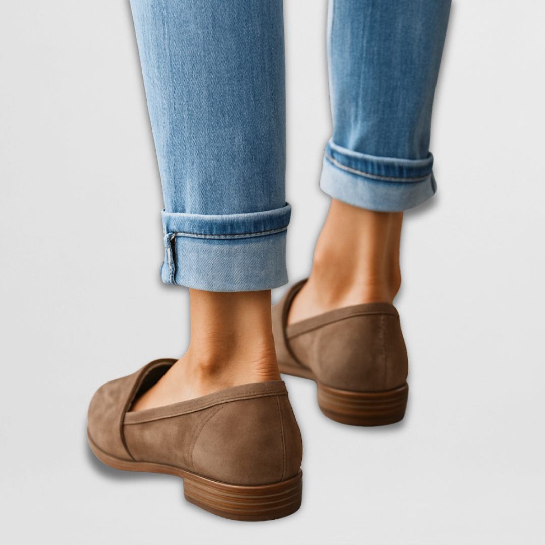 A woman wearing soft-touch loafers on a relaxed day out.