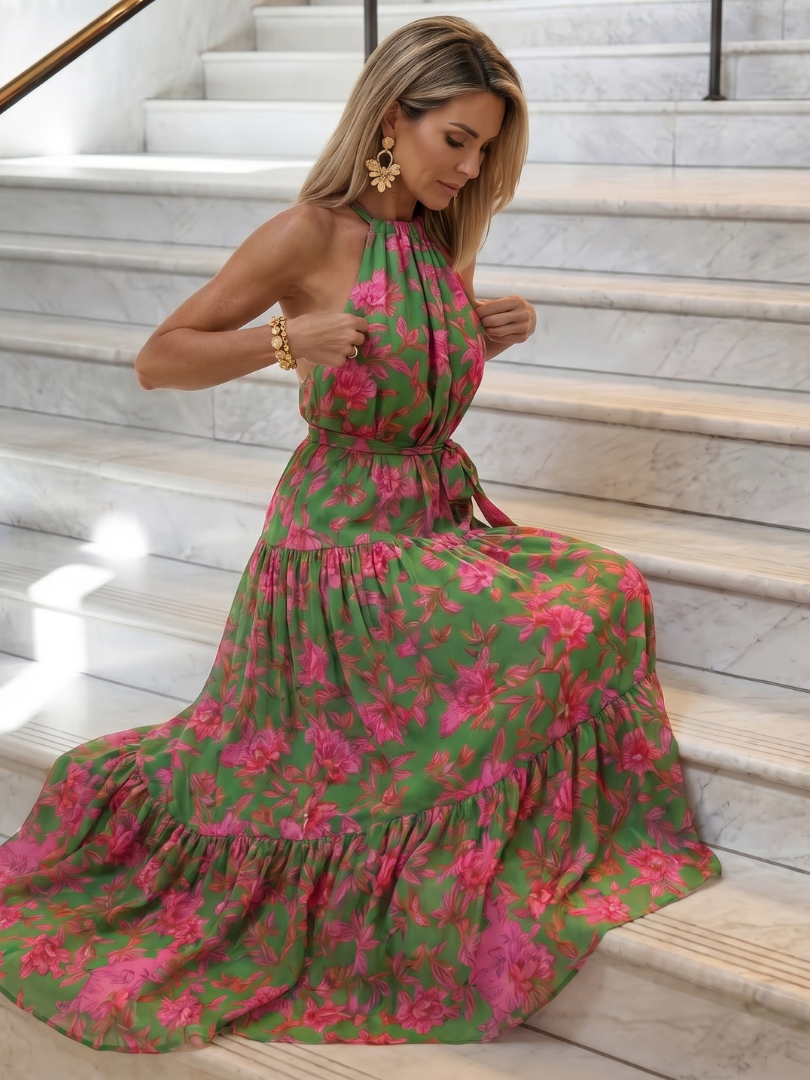 Floral halter-neck midi dress with softly draped bodice and layered flowing skirt