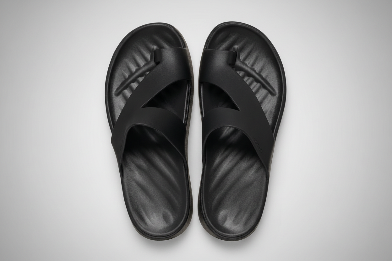 Minimalist cushioned sandal in a clean, low-profile modern design suitable for everyday wear