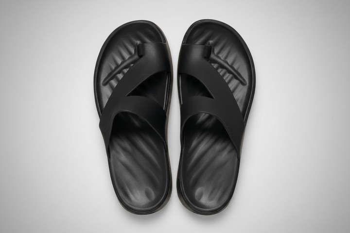 Minimalist cushioned sandal in a clean, low-profile modern design suitable for everyday wear