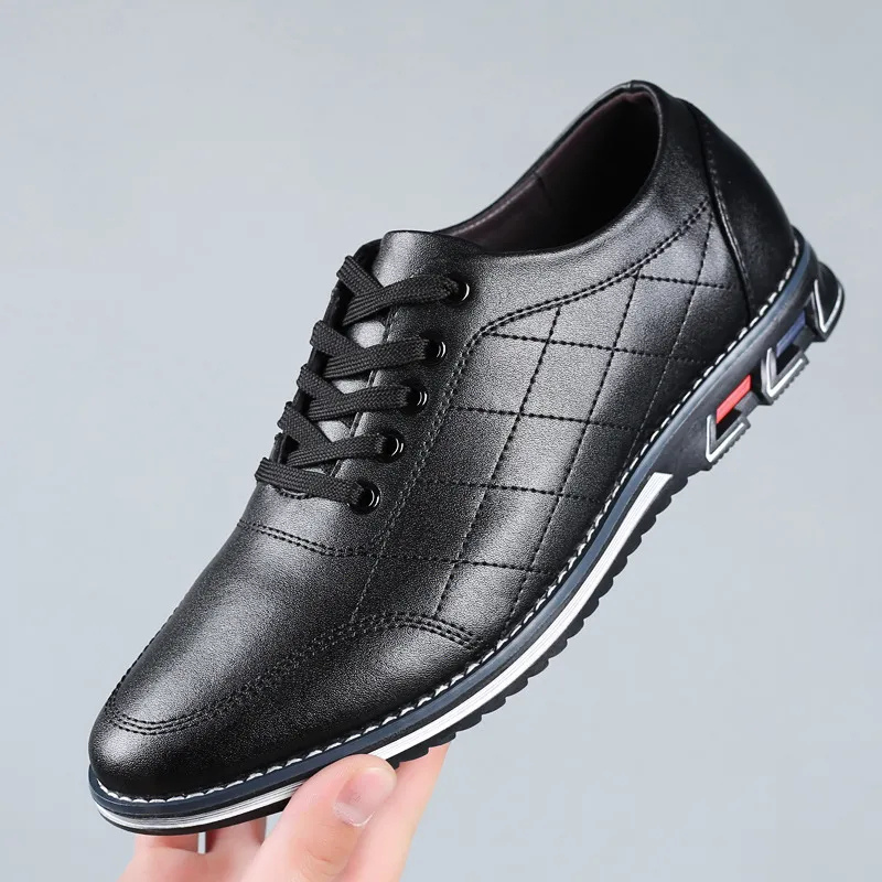 Men's black comfort dress shoes with a clean profile and polished upper on a neutral background
