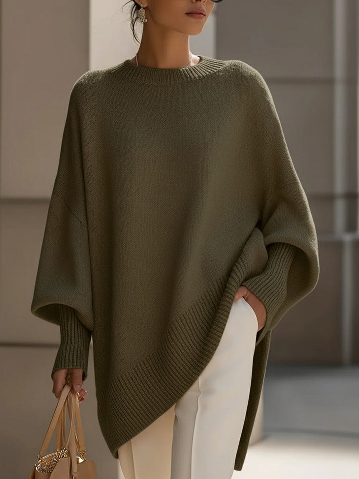 A woman wearing a soft crew neck jumper with jeans for a warm, easy everyday look.