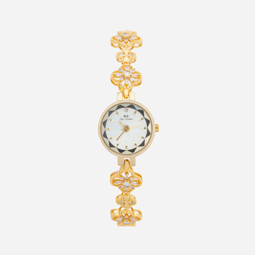 Women's gold-finish watch with rounded design and light-catching detailed face