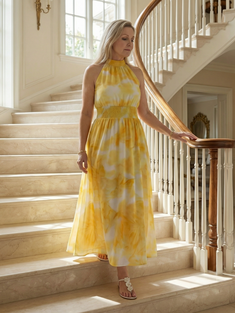 Yellow halter neck midi dress with a ruched waist detail in a clean, simple silhouette
