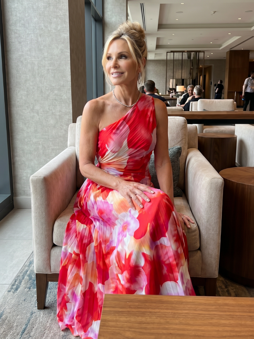 Floral one-shoulder midi dress with a pleated bodice and a flowing relaxed skirt