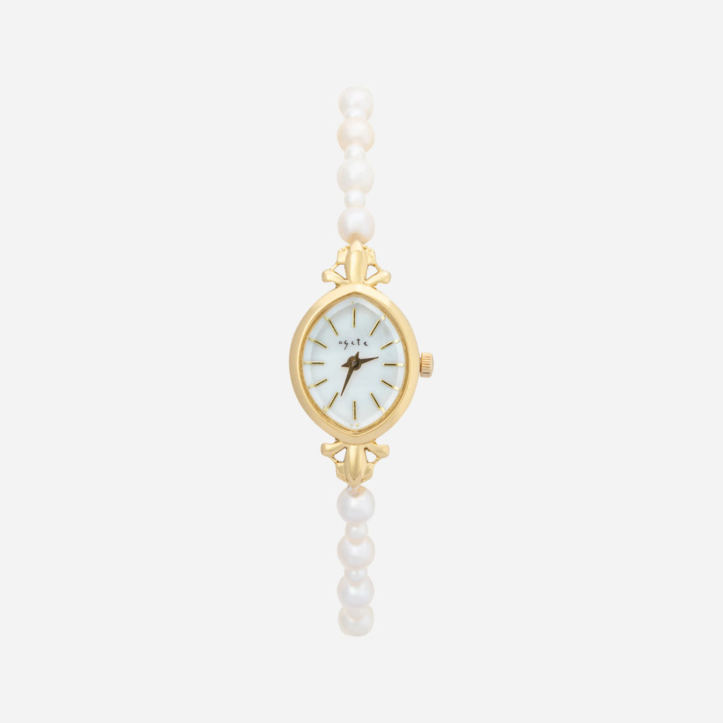 Elegant women's watch with crystal-set dial and delicate golden bracelet strap