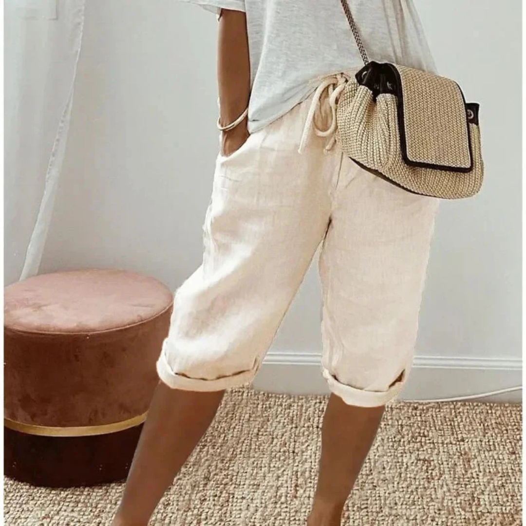 A pair of relaxed-fit summer shorts in beige with an elasticated drawstring waist
