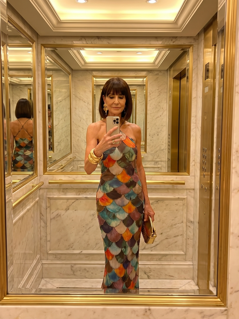 Geometric multicolour scale print halter neck maxi dress with a sleek fitted silhouette