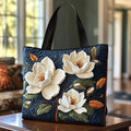 Quilted tote bag with a delicate magnolia floral print on a structured wave-stitch body