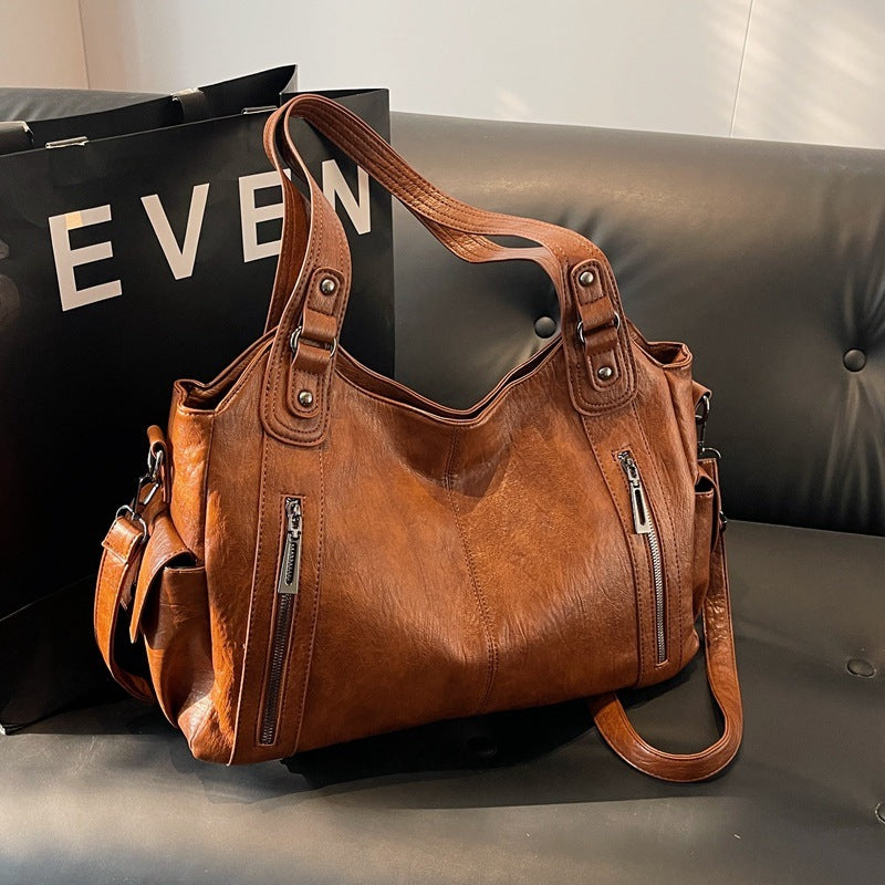 Classic structured tote bag in dark brown with comfortable shoulder straps