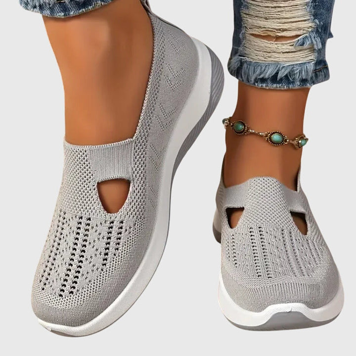 A woman out for a long walk in supportive orthopaedic walking shoes.