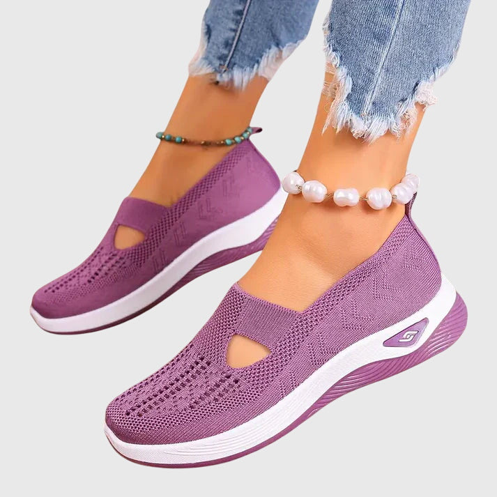 A woman out for a long walk in supportive orthopaedic walking shoes.