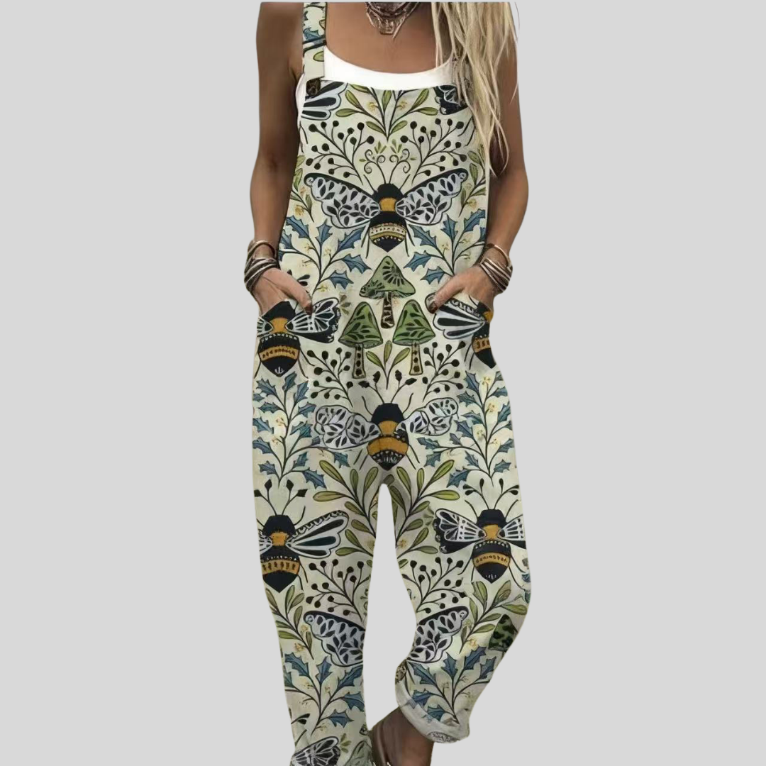 Women's relaxed wide-leg dungarees in cream with a symmetrical botanical print featuring large bumblebees, moths and olive foliage.