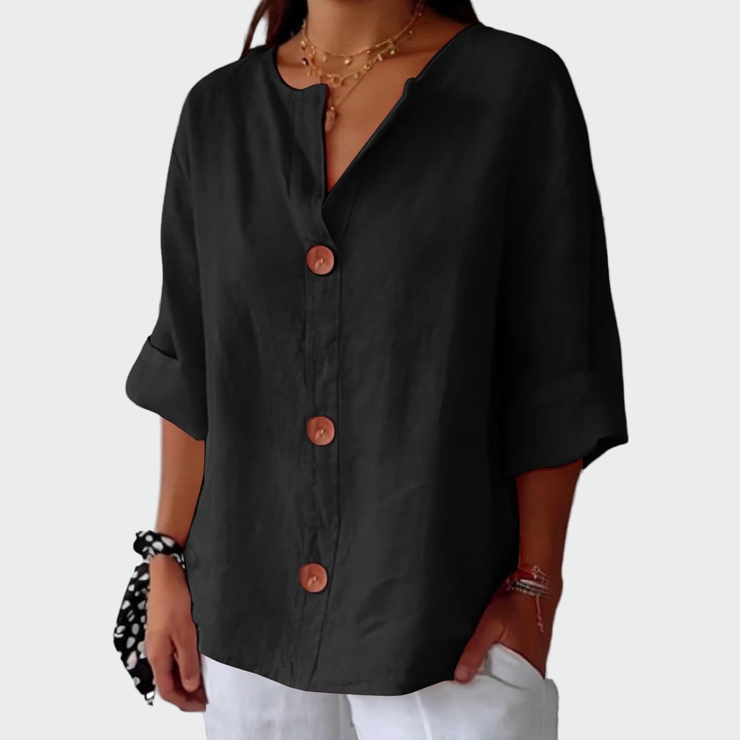 Cream relaxed-fit women's blouse with three-quarter sleeves and wooden front detail