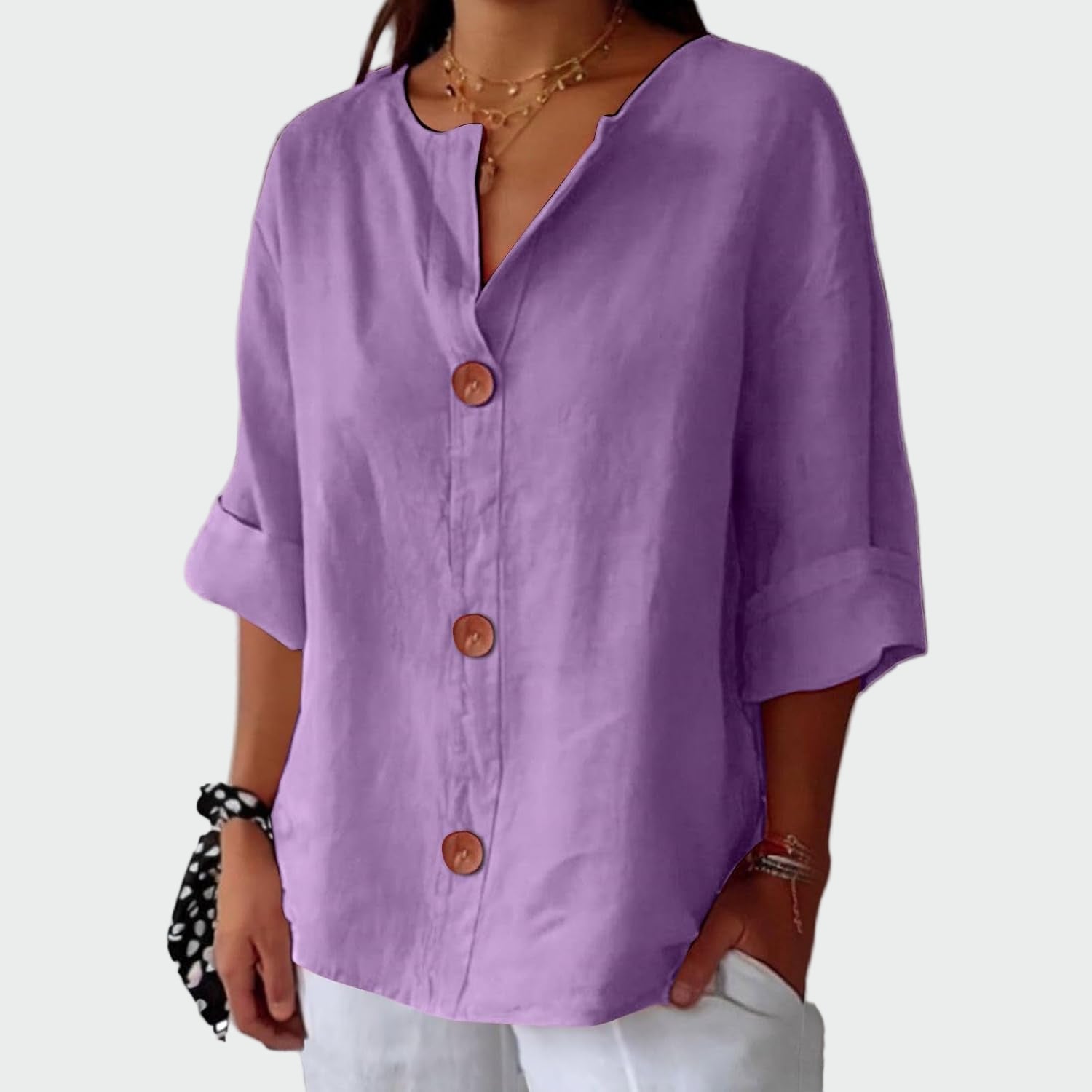 Relaxed ecru blouse with three-quarter sleeves and a natural minimalist front detail