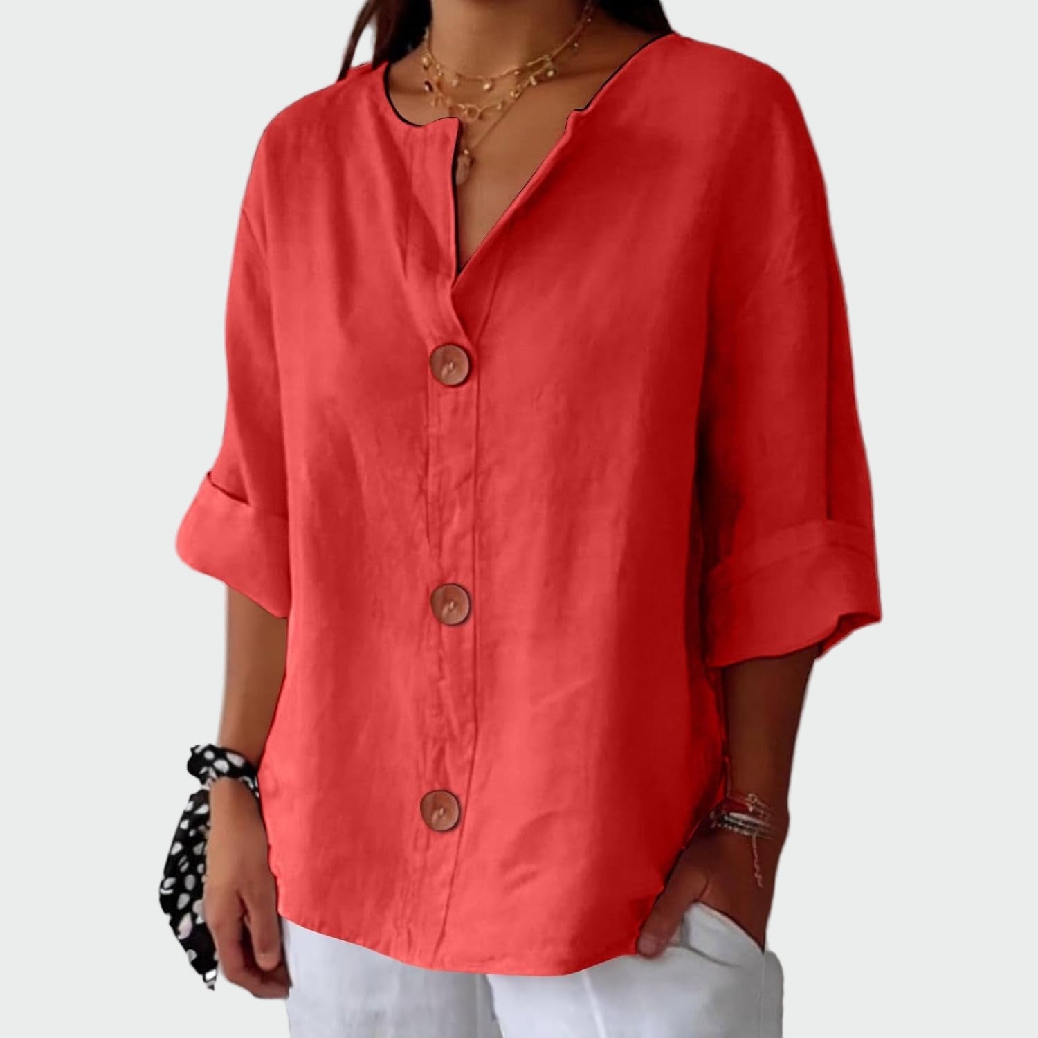 Cream relaxed-fit women's blouse with three-quarter sleeves and wooden front detail