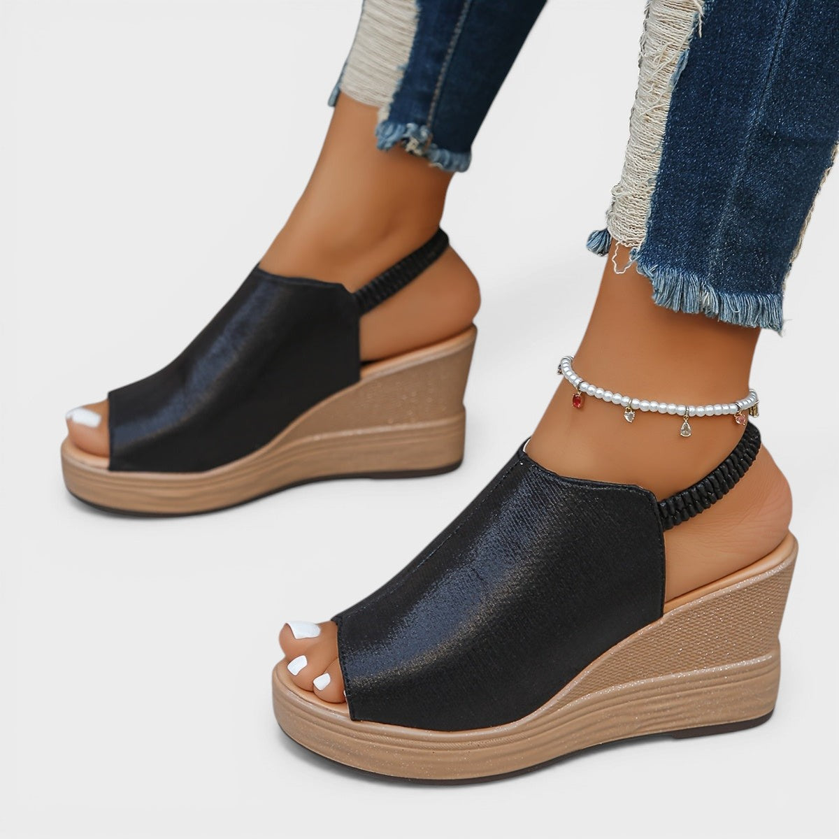 Orthopaedic wedge sandals in gold, silver and black with a supportive sole