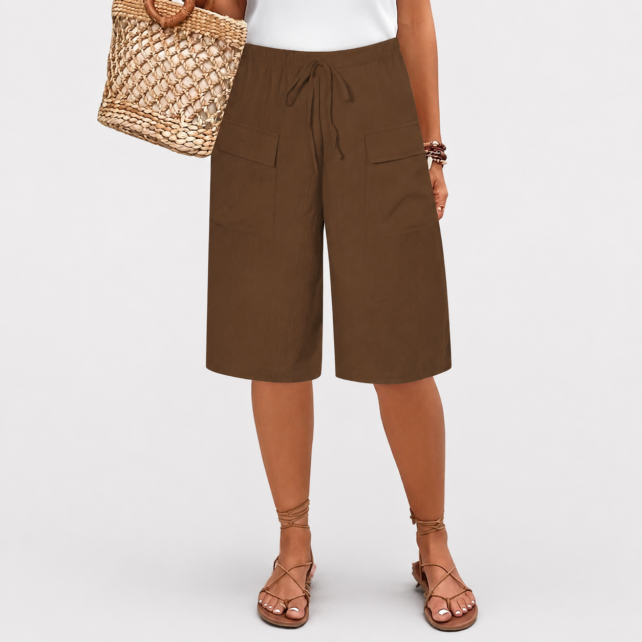 Women's high-waist shorts in terracotta with a relaxed leg and elasticated waistband