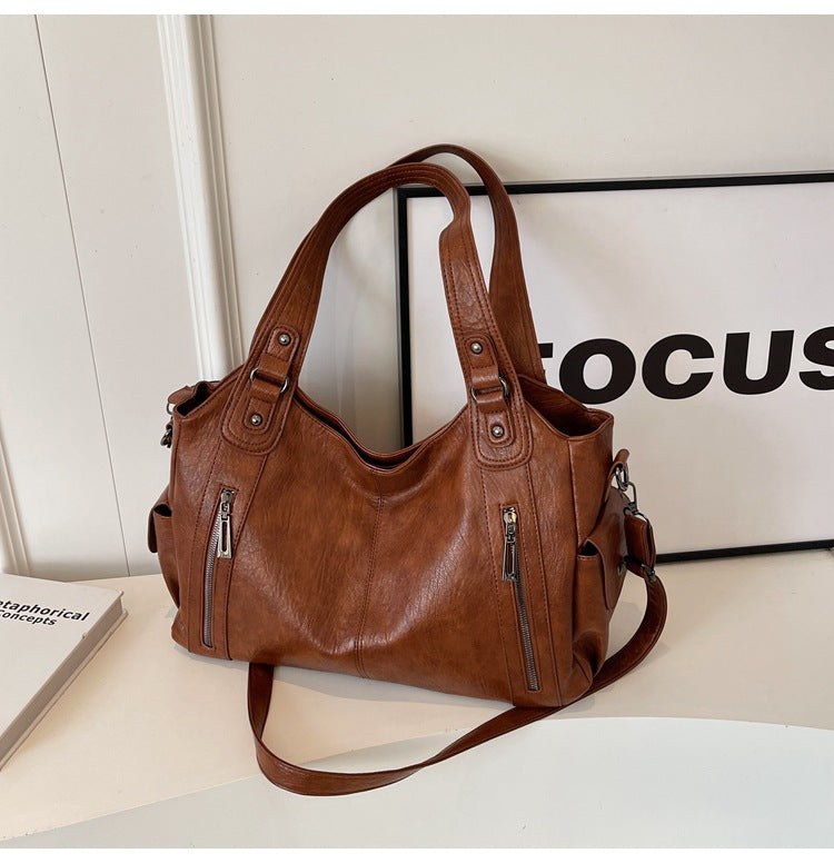 Classic structured tote bag in dark brown with comfortable shoulder straps