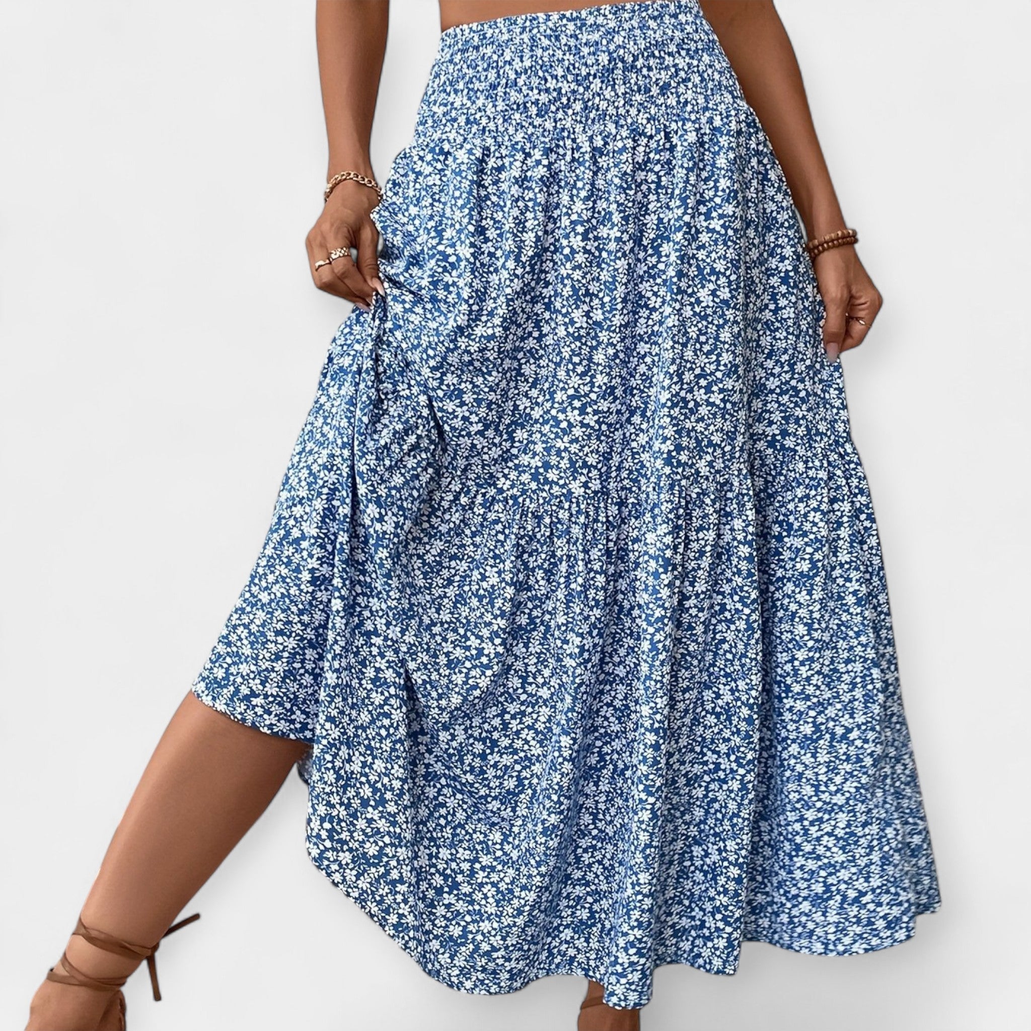 Floral midi skirt in violet print with elasticated waist and discreet side pockets
