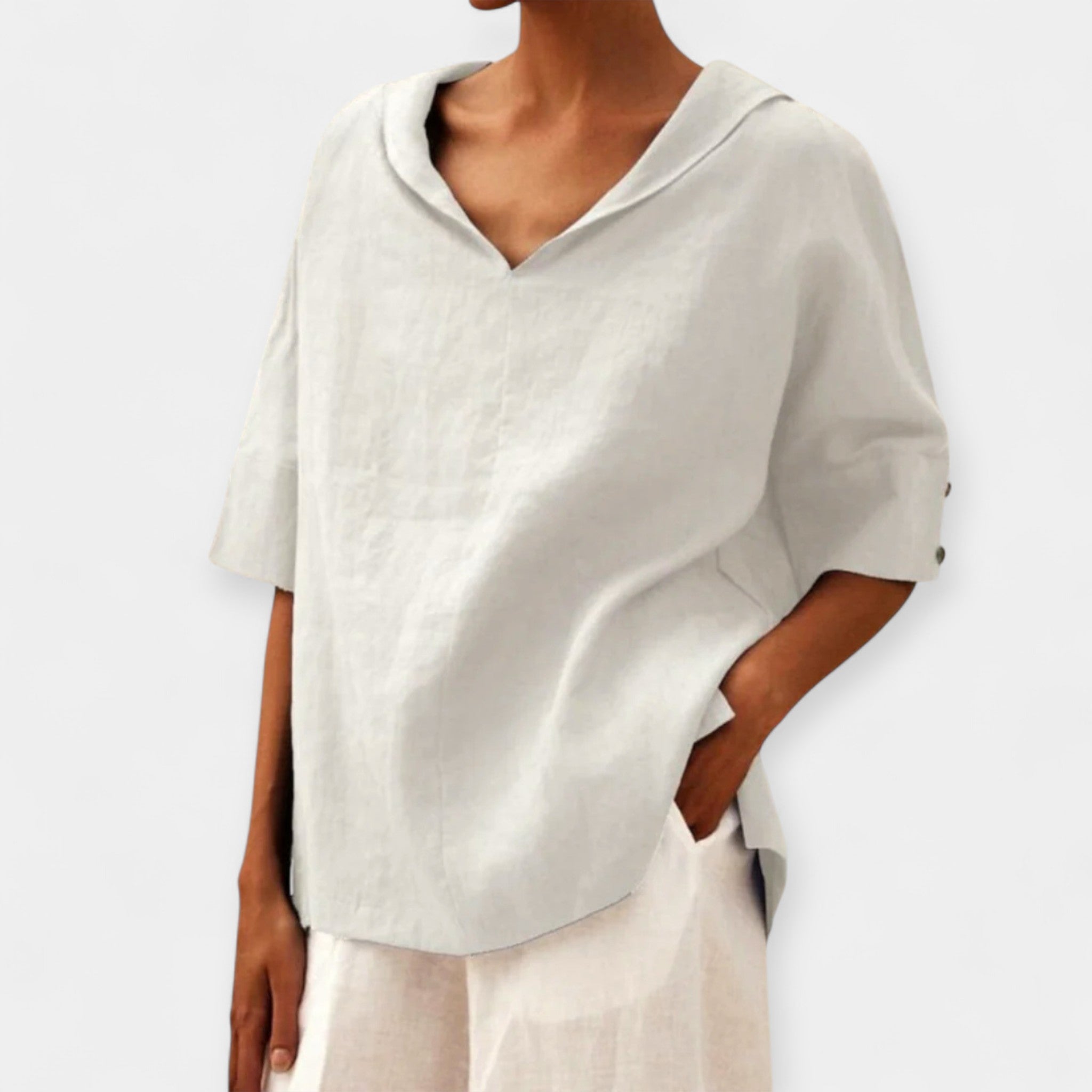 Green wide-cut relaxed blouse with a light, flowing silhouette and casual elegance