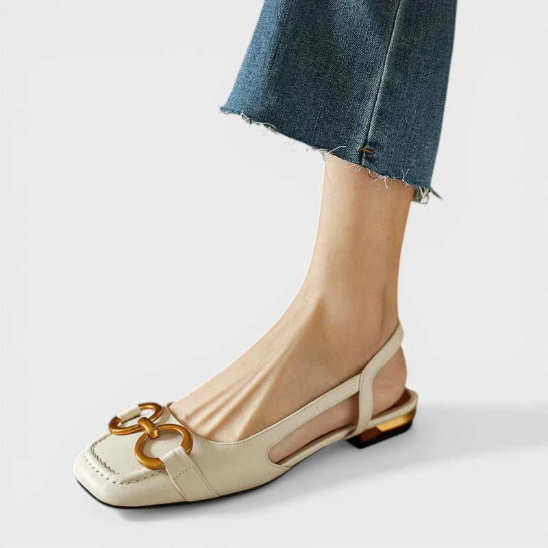 Adjustable orthopaedic sandals in beige and dark navy with supportive straps and cushioned footbed