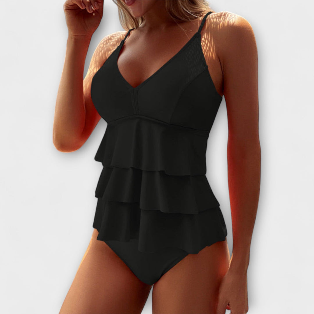 Coral frill tankini with a flowing frilled top and matching bottoms