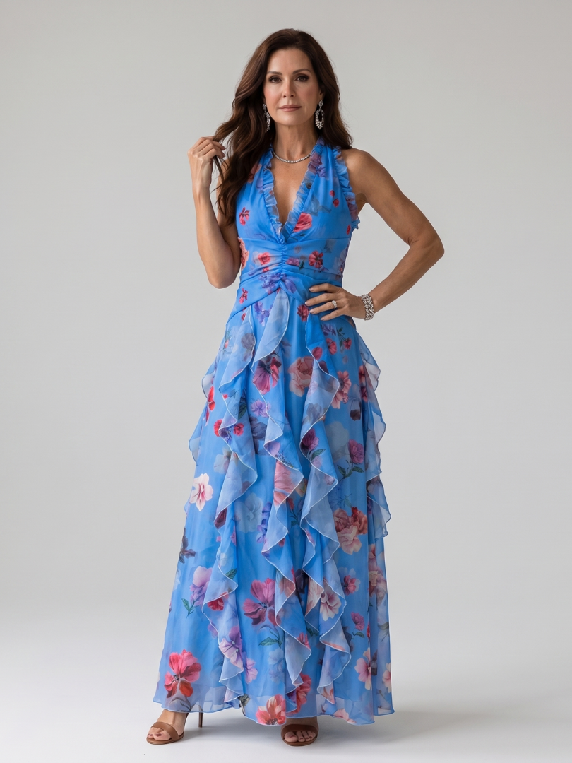 Pink floral halter maxi dress with a ruched bodice and layered ruffle skirt