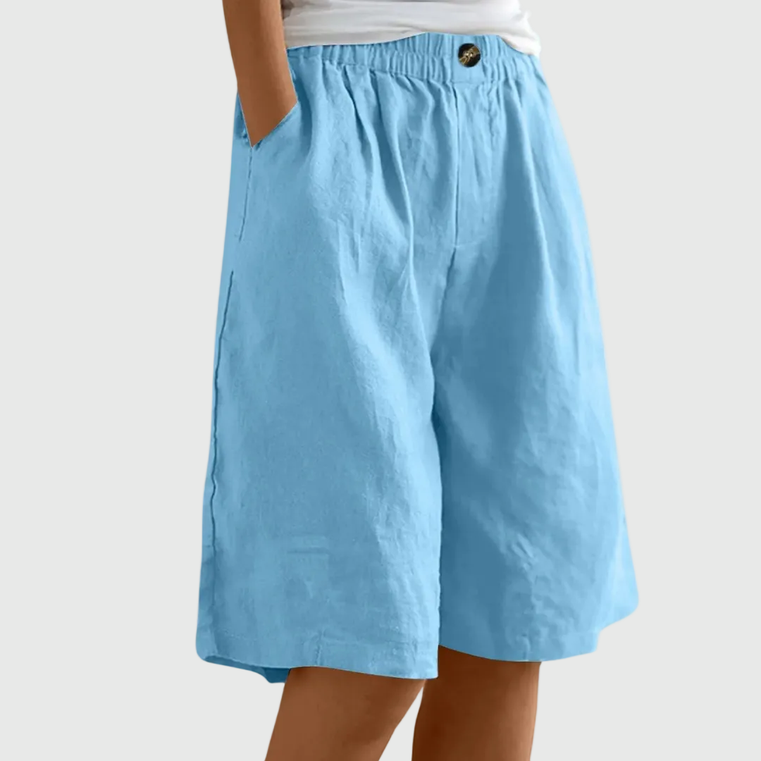 Women's casual leisure shorts in soft pink with an elasticated waist and relaxed fit