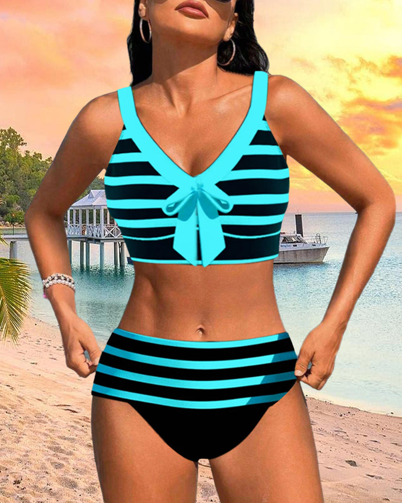Black and white striped high-waist bikini with a knotted front detail on the top