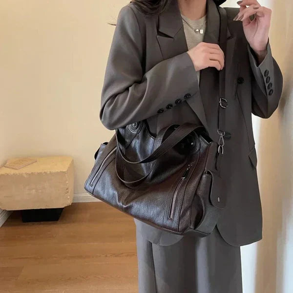 Classic structured tote bag in dark brown with comfortable shoulder straps